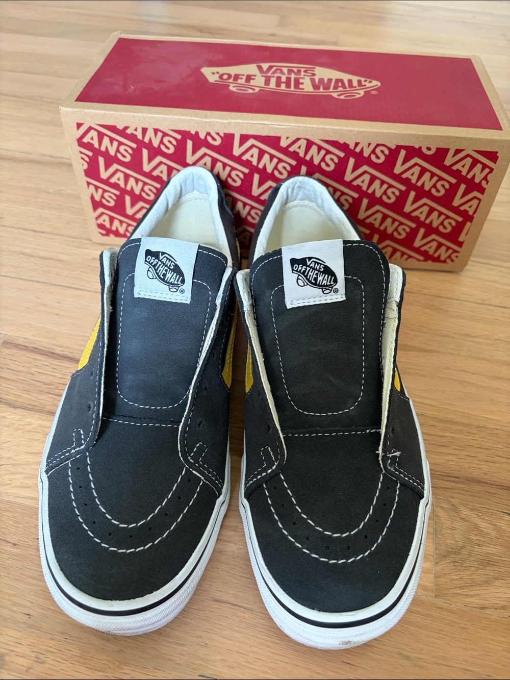 Vans Slip-On Suede Sneakers in Black and Yellow